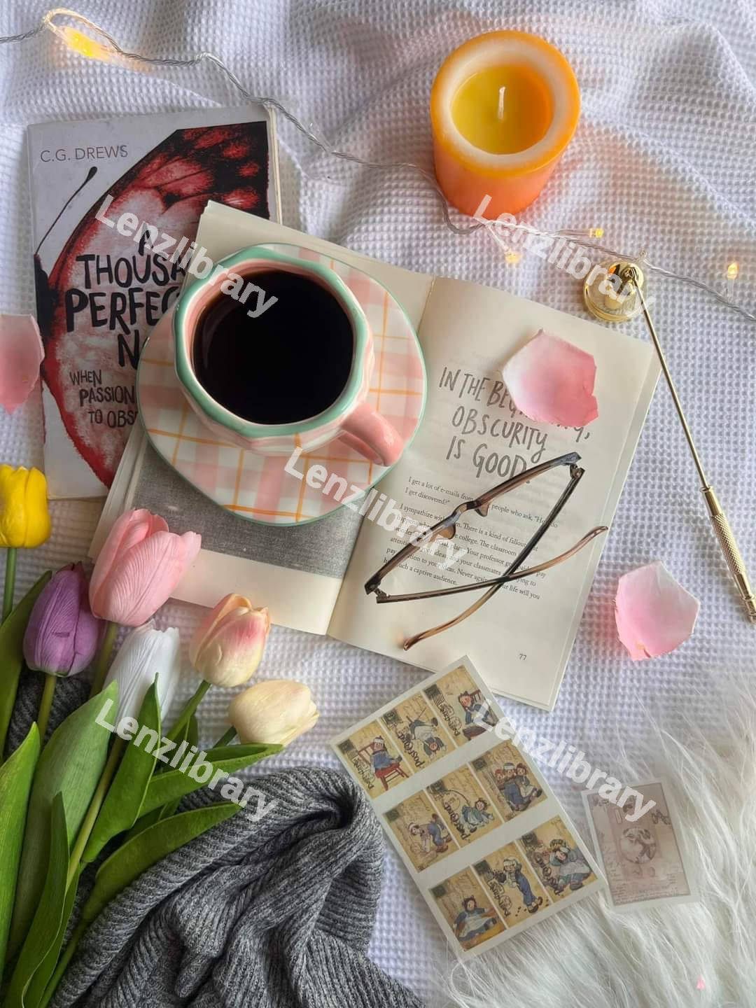 Cup of coffee on top of a book